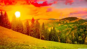 a colorful sunset over a mountain