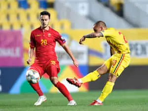 Alexandru Mitrita Kicking The Ball Past Mirko Ivanic