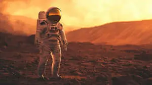 Astronaut Standing on Alien Planet With Orange Sky  
