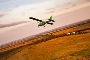 Aviation Soaring Green Biplane
