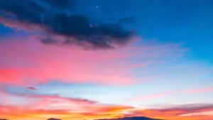 Embrace the beauty of nature with a stunning vibrant sky from the countryside
