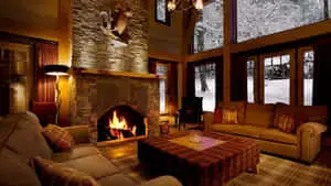 Warm and Inviting Cozy Winter Cabin Nestled in the Snow