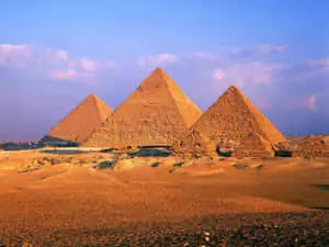 Majestic Giza Pyramids Bathed in Golden Sunset Glow
