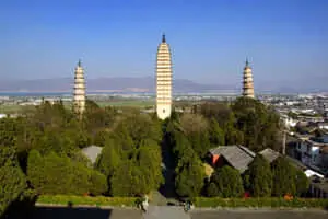 Three Pagodas With Green Trees