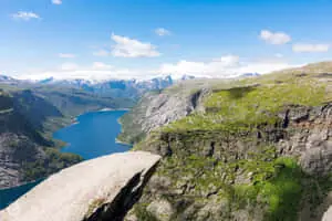 Trolltunga With Clear View Of Green Moss