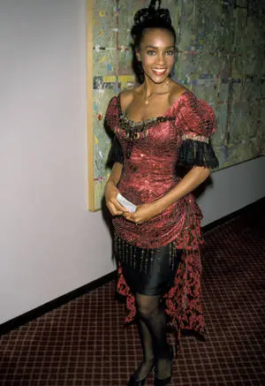 Vivica Fox in elegant pink and black dress