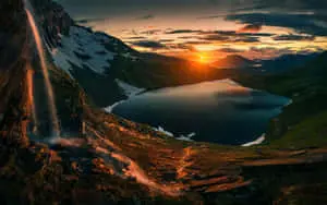 Waterfall And Mountains Sunset Landscape